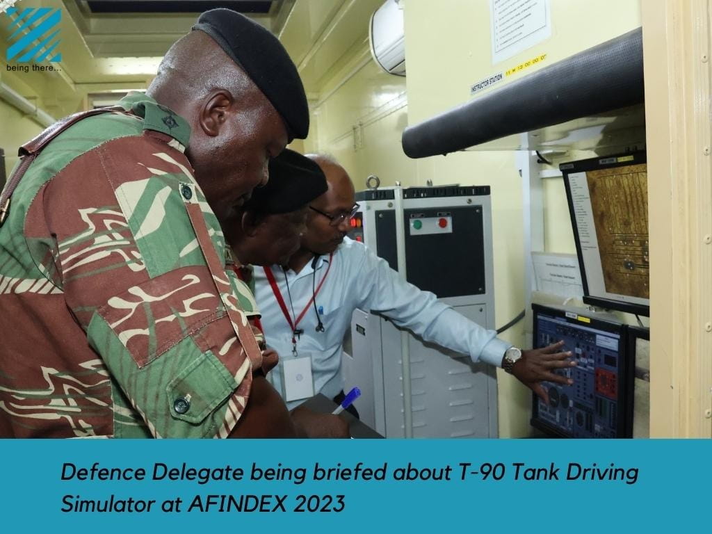 Defence Delegate being briefed about T-90 Tank Driving Simulator at AFINDEX 2023